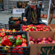 Person shops at farmers market.