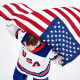 Aerial view of Brady Tkachuk holding an American flag in the air