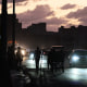 People transit on a street without power during a nation wide blackout in Havana on March 21, 2026. A power outage struck the entire island of Cuba on March 21, 2026, the energy ministry said, in the second nationwide blackout in less than a week as its grid struggles under a U.S. oil blockade.