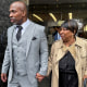 Kenneth Windley, left, leaves a courthouse with his mother, Francina Windley Patterson.