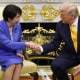 Japanese Prime Minister Sanae Takaichi shakes hands with President Donald Trump in the Oval Office