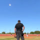 A meteor flies through the sky during a baseball game