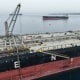 The Greek-flagged crude oil tanker "Asahi Princess" is made ready at the Syrian Baniyas port refinery on the coast of the Mediterranean Sea on April 15.