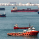 Oil tank farm and ships off the coast of Singapore