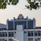 Students play soccer with the Ohio Stadium in the background
