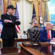 President Trump and Elon Musk in White House's Oval Office.
