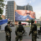Soldiers standing in a central intersection in Tehran.