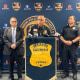 Chief Miguel A. Rodriguez Jr., center, speaks