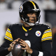 Mike Florio and Michael Holley analyze the ongoing situation between Aaron Rodgers and the Pittsburgh Steers, explaining why compensation is likely what the two sides still need to iron out.