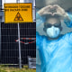 Hantavirus sign, patient, man in white hazmat suit