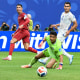 Cristiano Ronaldo reacts as he scores his team's third goal