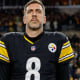 Mike Florio discusses Tom Brady calling Aaron Rodgers the best passer the NFL has seen, and Florio debates whether arm talent can earn Rodgers the "GOAT" title despite only winning one Super Bowl.