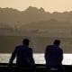 Commercial vessels and oil tankers preparing to transit through the Strait of Hormuz, one of the most critical strategic waterways for global trade flows, maintain their wait in the Gulf of Oman, on June 17, 2026.