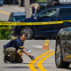 FBI investigators work the scene of ICE-involved shooting in Biddeford, Maine, on July 13, 2026. 
