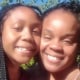 Joniah Walker, left, and her mother Tanesha Howard press their cheeks together for a photo outside