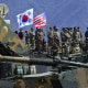 Image: South Korean and US soldiers watching from an observation post during a joint live firing drill between South Korea and the US at the Seungjin Fire Training Field in Pocheon, northeast of Seoul