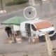 A drone circles over a man at a market in Kherson, southern Ukraine, before detonating nearby, in an incident that Ukrainian authorities said occurred on August 4, 2026, amid Russia's attack on Ukraine, in this still image obtained from a handout video on August 4, 2026.