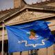 A flag outside the Robert F. Kennedy Department of Justice Building.