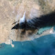 Satellite Imagery Of The Aramco Oil Terminal At Jizan In Saudi Arabia, black smoke can be seen billowing