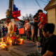 People stand and protest at a vigil in Houston, Texas.