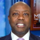 Tim Scott speaks while seated on the set of "Meet the Press"