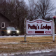 A New York State Trooper vehicle is parked at Patty’s Lodge in Hopewell, N.Y