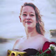 A portrait of Rene Nicole Good at a makeshift memorial in front of the U.S. Embassy in Berlin.
