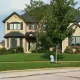 A house is seen in a neighborhood.
