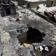 A destroyed rooftop is seen in an aerial view