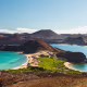 View on the volcanic landscape of Bartolome Island with famous Pinnacle Rock and Golden Beach, Galapagos Islands, Ecuador