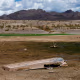 An abandoned boat sits in an area of Lake Mead that was previously underwater.