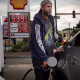 Driver fills his car with gas