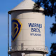 A split image of two water towers, from left, one for Warner Bros Studios, and one for Paramount