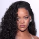 Rihanna posing for a photo.