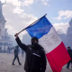 Protesters with a French flag during demonstrations.