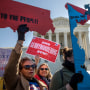 Image: Demonstrators protest against gerrymandering at the Supreme Court on March 26, 2019/