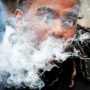 Image: FILE PHOTO: A demonstrator vapes during a protest in Boston