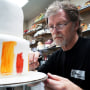 Baker Jack Phillips decorates a cake in his Masterpiece Cakeshop in Lakewood