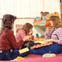 1980s Three Teenage Girls Eating Pizza And French Fries And Drinking Canned Soda In Dorm RoomClassicStock / Contributor
