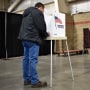 Voters fill out their ballots at the MetraPark events center in Billings, Mont., on Nov. 3, 2020.