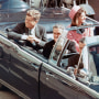 Kennedys Riding in Dallas Motorcade