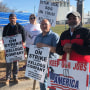 Striking Kellogg's workers
stand outside the Omaha, Neb., Kellogg's cereal plant on, Dec. 2, 2021.