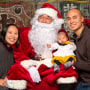 A family poses with Al Young, dressed as Santa, at the Wing Luke Museum of the Asian Pacific American Experience in Seattle in 2019.
