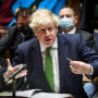 Image: British PM Johnson speaks during the weekly question time debate at Parliament in London