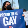 People protest in front of Florida State Sen. Ileana Garcia's office after the passage of the Parental Rights in Education bill, dubbed the "Don't Say Gay" by critics, on March 9, 2022, in Miami.