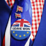 Image: A pro-Brexit activist wears a Leave button as he demonstrates outside the Houses of Parliament in Westminster, London on March 28, 2019.