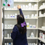 A pharmacy technician, works in a pharmacy on Dec. 22, 2020 in Miami.