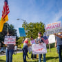 Healthcare workers hold protest against state mandated Covid-19 vaccinations outside St. Catherine of Siena Hospital in Smithtown, N.Y., on Sept. 27, 2021.