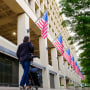 A person walks in front of the FBI headquarters