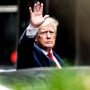 Former President Donald Trump waves as he departs Trump Tower on Aug. 10, 2022, in New York.
